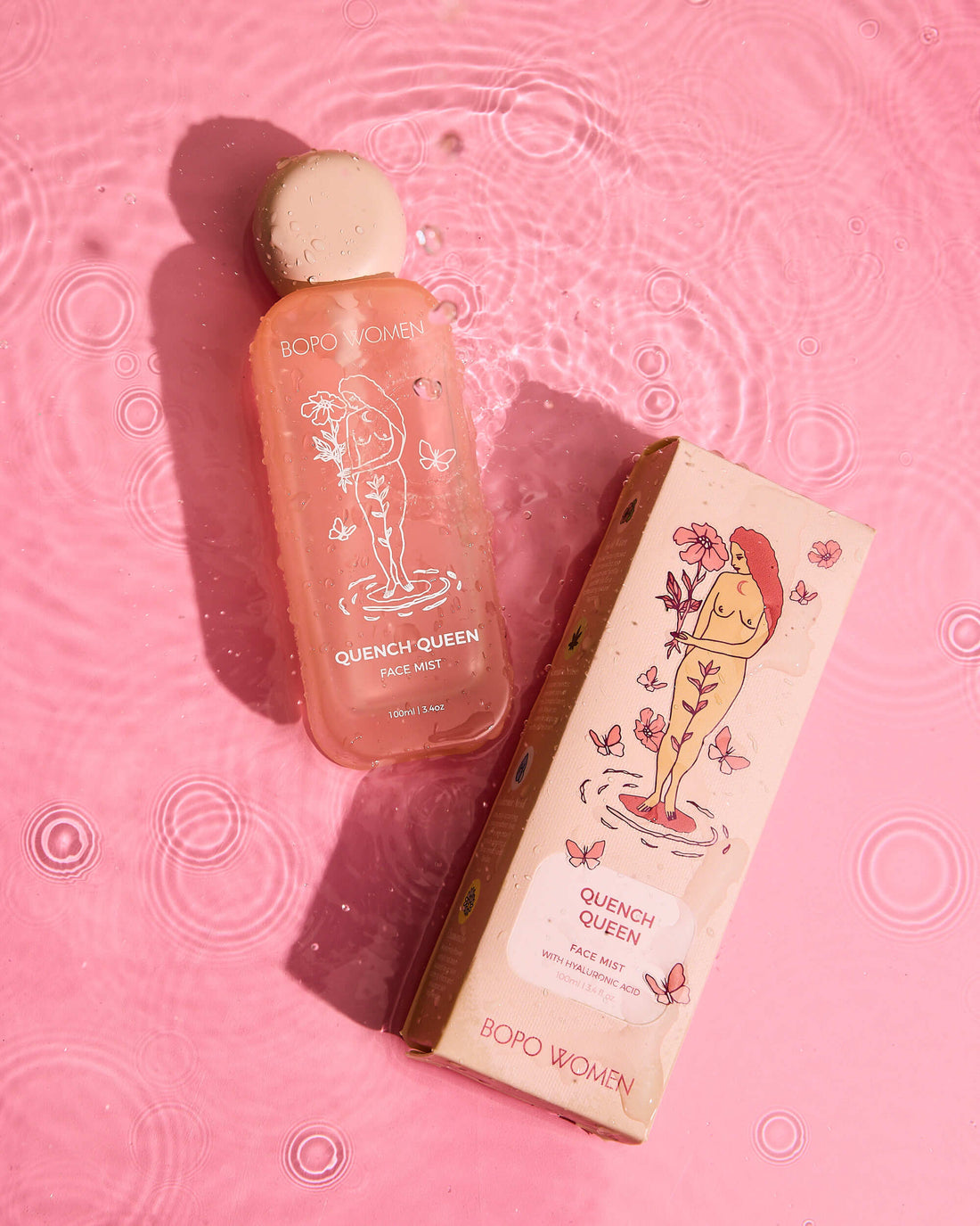Boro Women Quench Queen bottle and box on a pink background