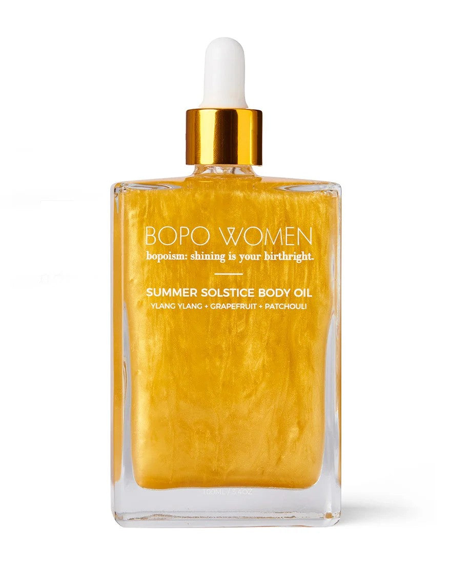 Bodo Women's perfume bottle and packaging on a reflective surface