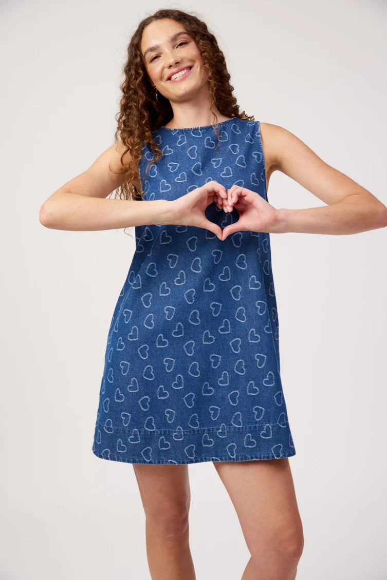  sleeveless blue dress with a white heart pattern, 