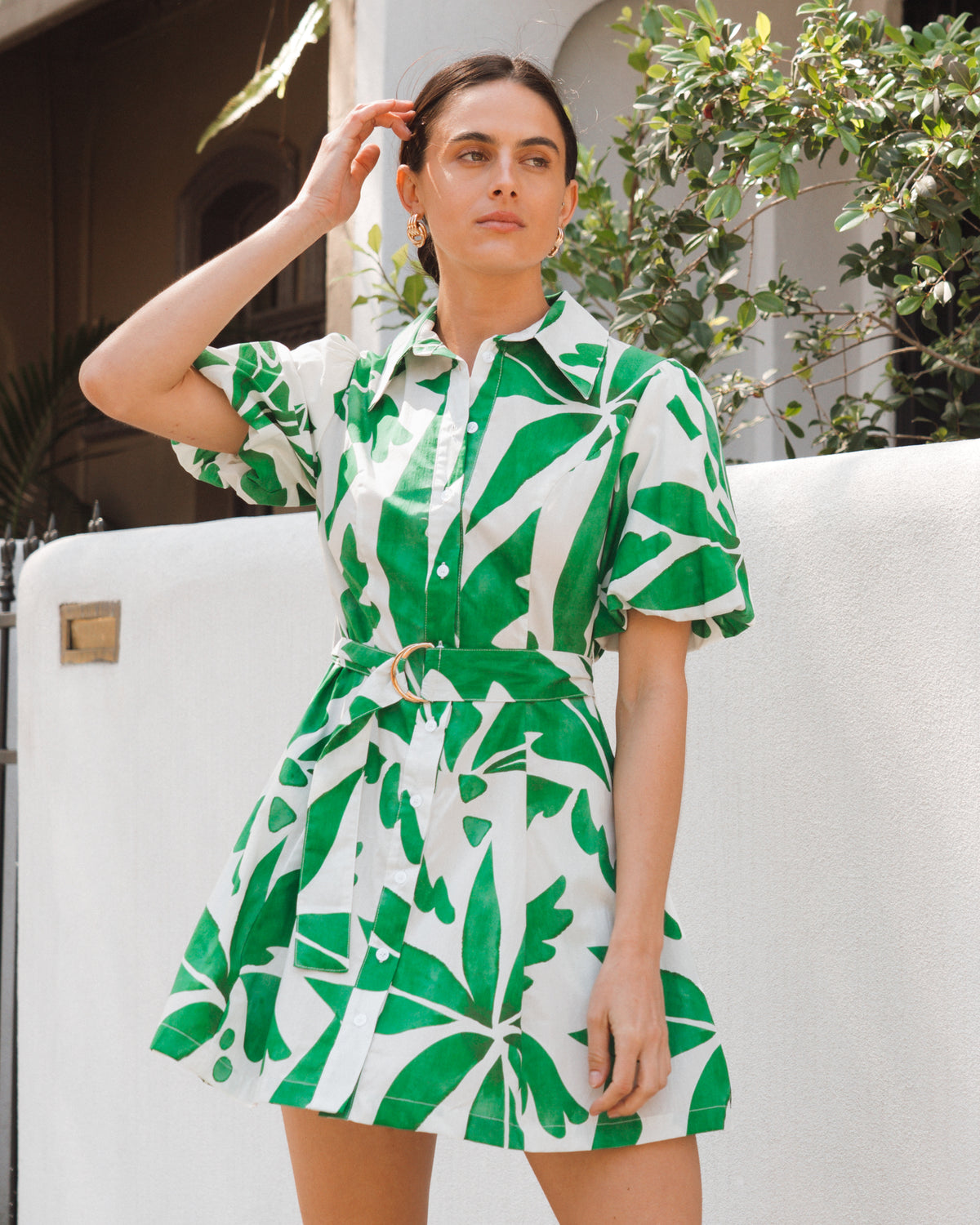 White Closet Palm Rio Mini dress in white with green botanical print and belted waist