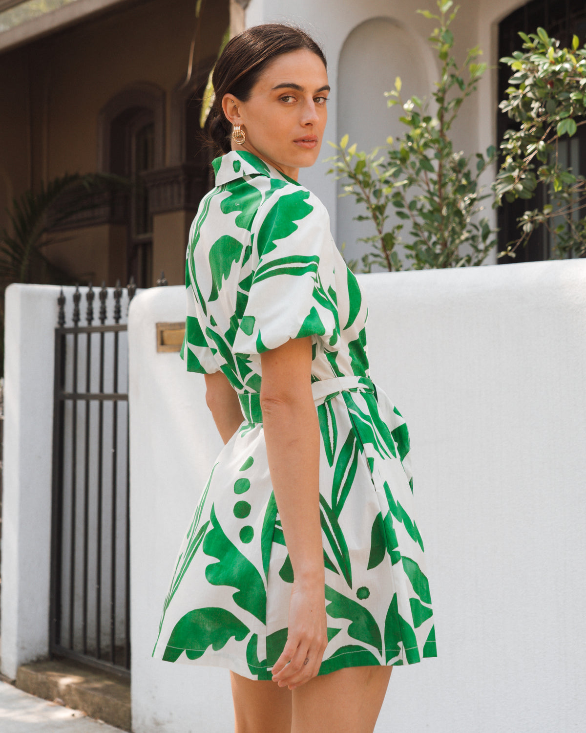 White Closet Palm Rio Mini dress in white with green botanical print and belted waist