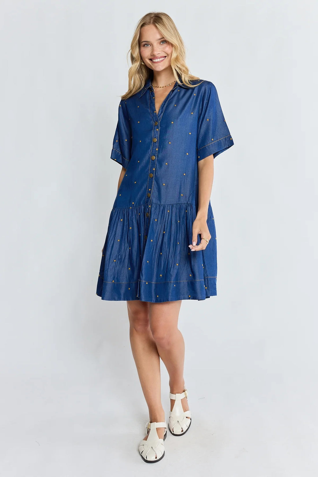 Ibisa River Dress in indigo blue with gold dot print and button front