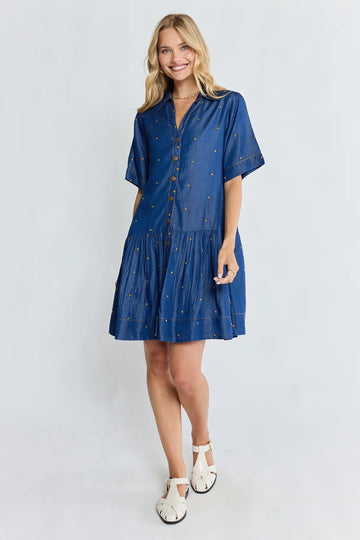 Ibisa River Dress in indigo blue with gold dot print and button front