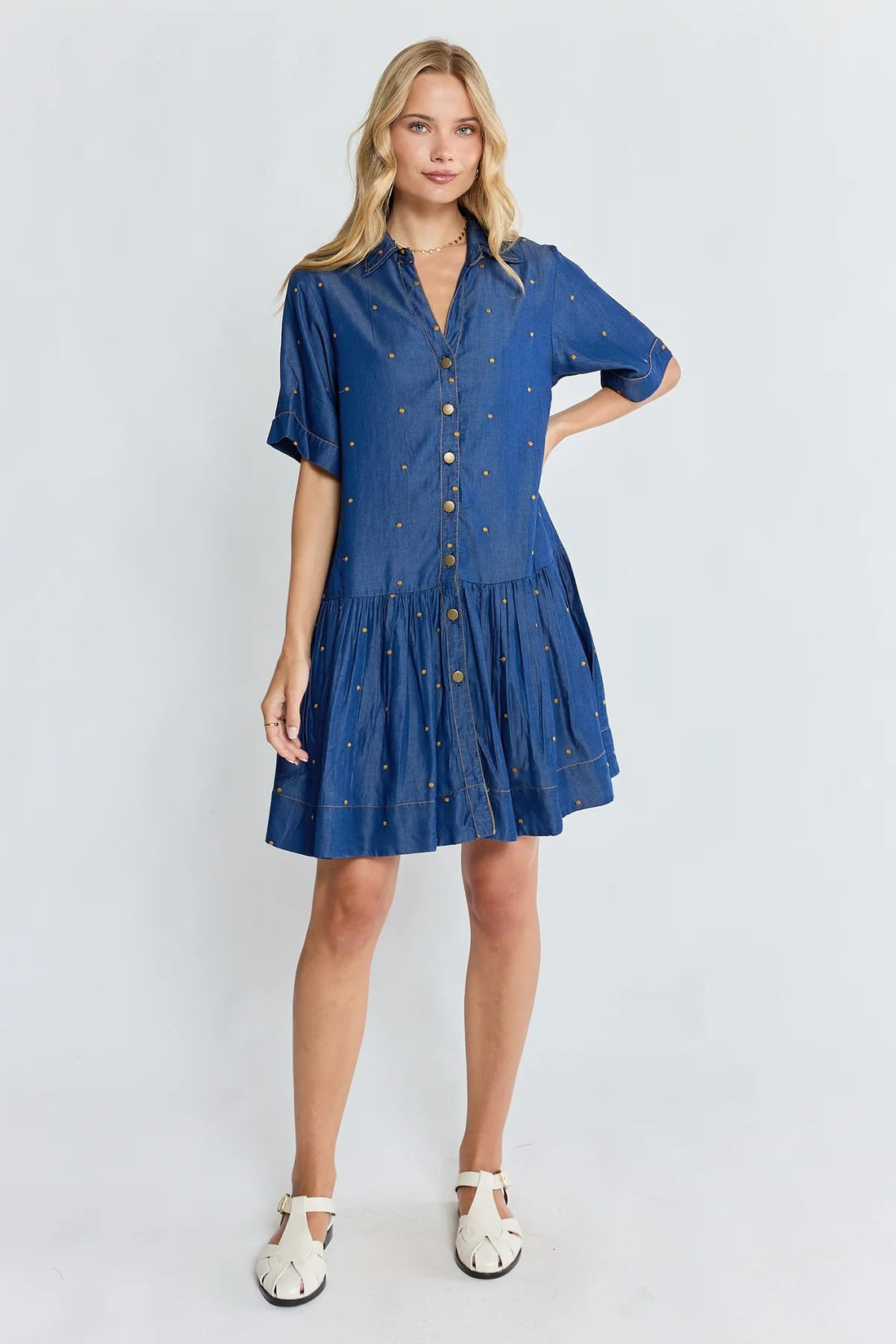 Ibisa River Dress in indigo blue with gold dot print and button front