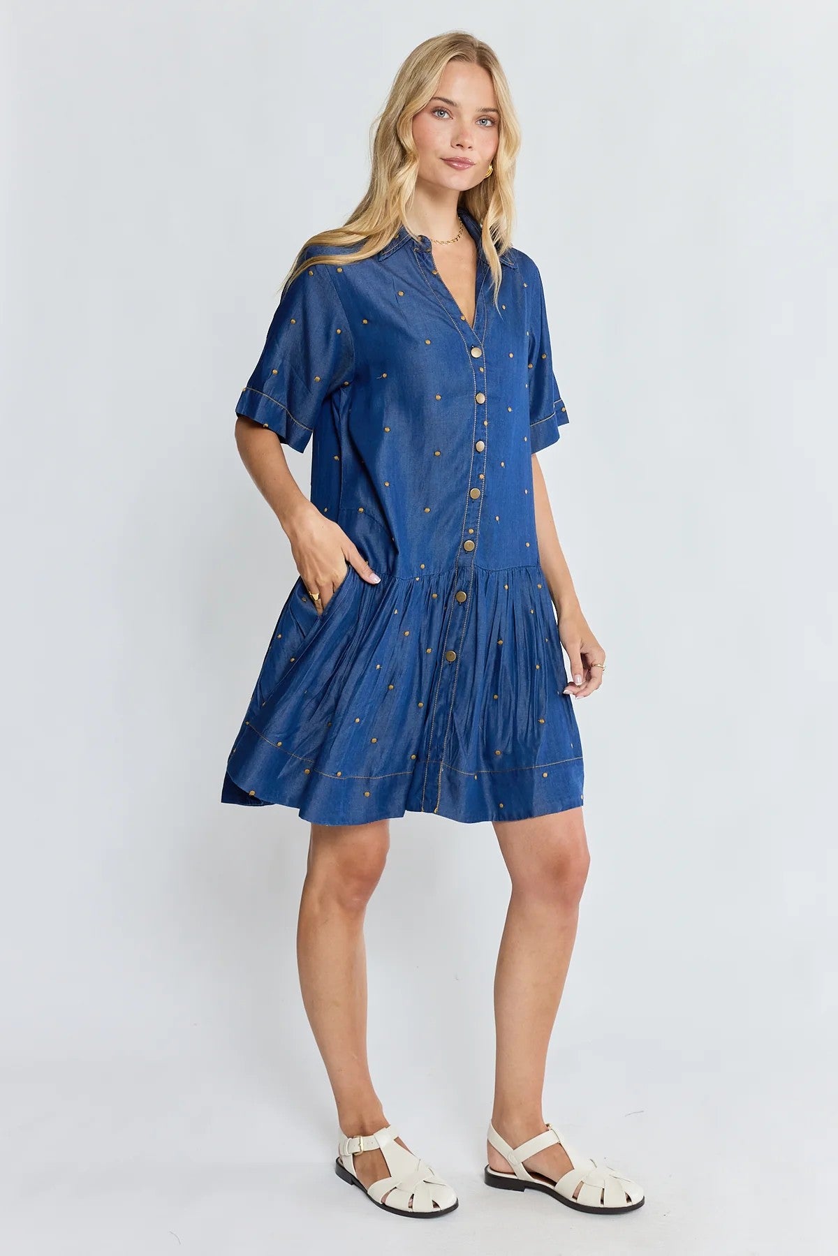 Ibisa River Dress in indigo blue with gold dot print and button front